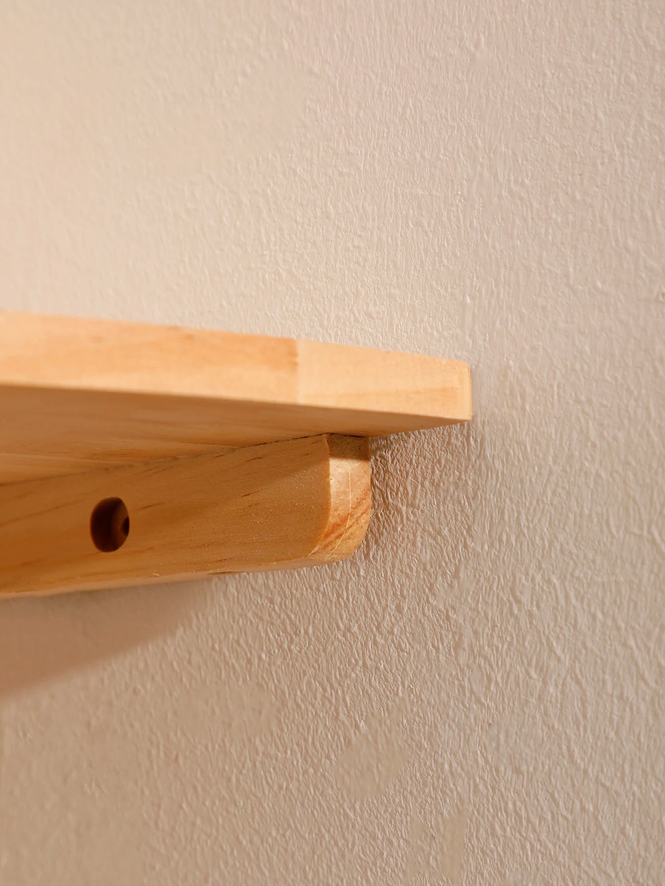 Washed wood curved corner shelves